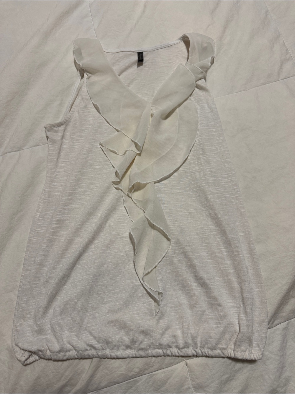 Sleeveless White Ruffle V-Neck Top